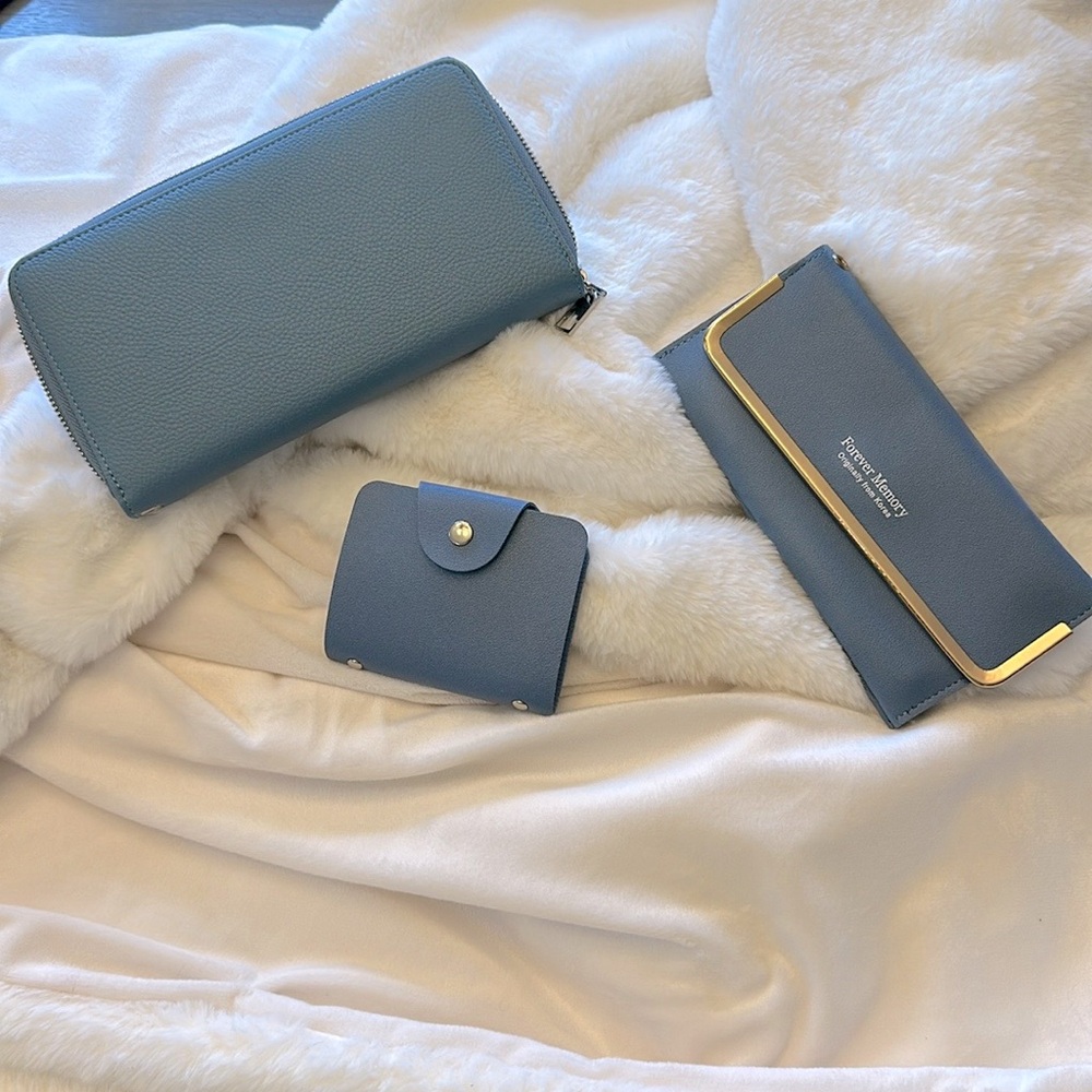 New set of 3 beautiful blue wallets and card holder.